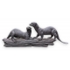 Couple de loutres sur une branche en bronze