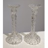 A pair of moulded glass candle holders from Portieux
