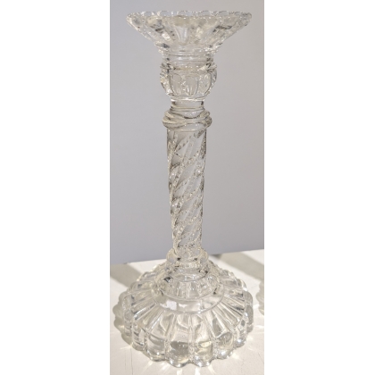 A pair of moulded glass candle holders from Portieux