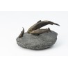 Bronze sculpture entitled ‘Three Trout’ on a stone