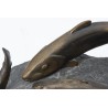 Bronze sculpture entitled ‘Three Trout’ on a stone