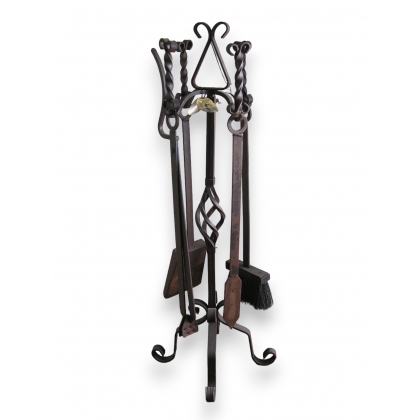  Garniture de cheminée en fer forgé sur  Moinat SA  - Antiquités décoration