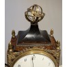 Empire-style wooden and bronze vase clock