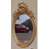 Grand miroir ovale Louis XVI doré