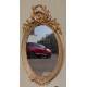 Grand miroir ovale Louis XVI doré
