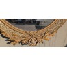 Grand miroir ovale Louis XVI doré