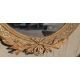 Grand miroir ovale Louis XVI doré