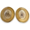 Paire de cadres ovales en bois doré