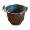 Copper bucket with a wrought-iron handle