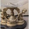 Coupe ovale en cristal sur deux anges en bronze