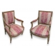 Paire de Fauteuils style Louis XVI dorés