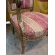 Paire de Fauteuils style Louis XVI dorés