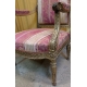 Paire de Fauteuils style Louis XVI dorés