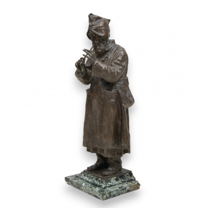 Bronze \"Joueur de flute\" signé E. BAZZARO