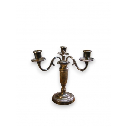 Pair of Louis XVI-style candlesticks. Available from Moinat SA – Antiques and home décor