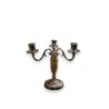 Pair of Louis XVI-style candlesticks. Available from Moinat SA – Antiques and home décor