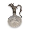 Carafe en cristal taillé avec monture en argent