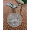 Carafe en cristal taillé avec monture en argent