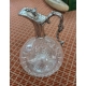 Carafe en cristal taillé avec monture en argent