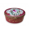 Boite ovale en porcelaine rose de Limoges