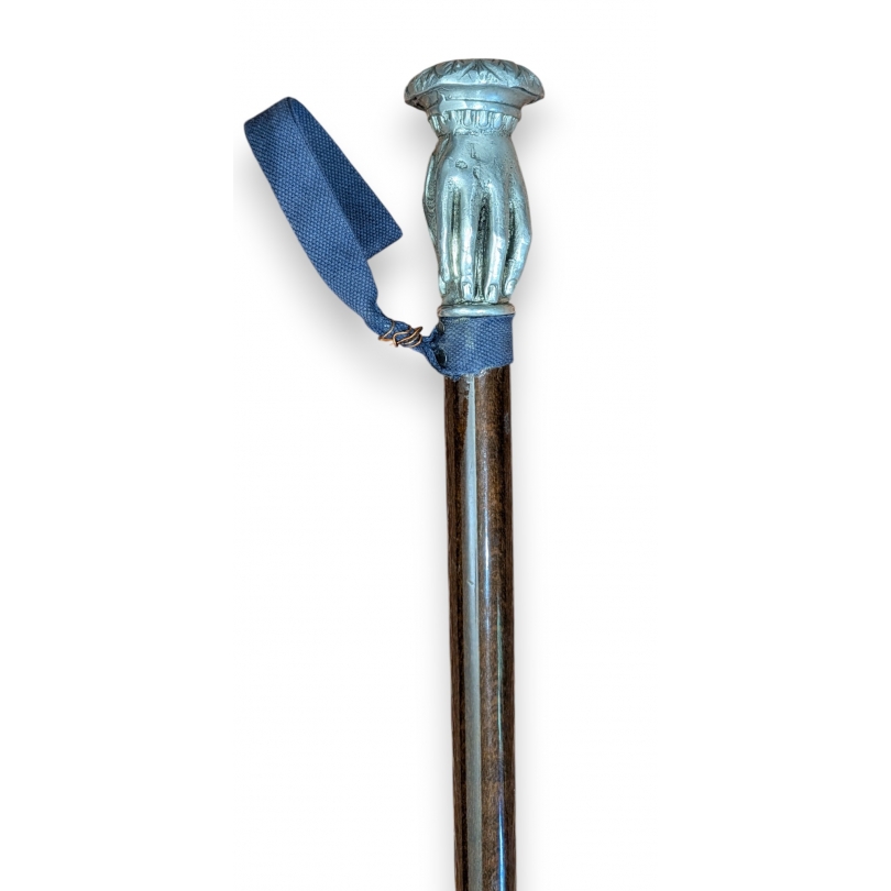 Pewter walking stick with a knob at the top