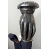 Pewter walking stick with a knob at the top