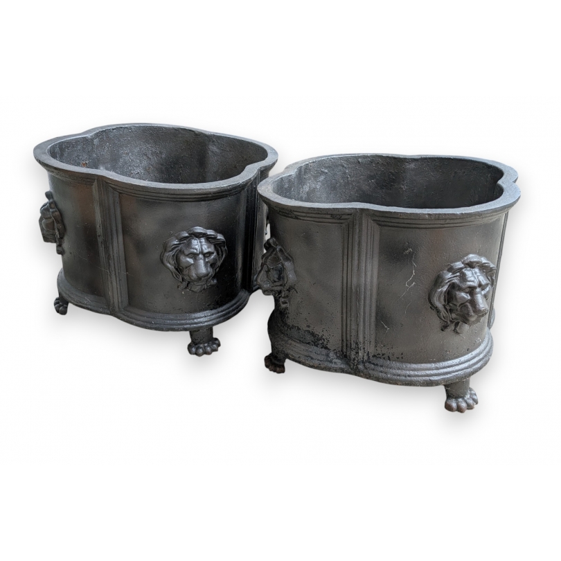 Pair of cast-iron lion-head planters