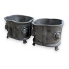 Pair of cast-iron lion-head planters