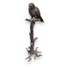 Perroquet sur une branche en bronze