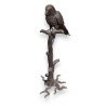 Perroquet sur une branche en bronze