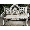 White cast-iron garden bench