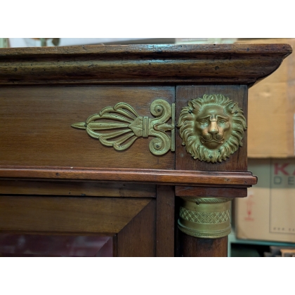 Empire-style display cabinet with columns