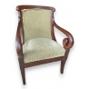 Suite de 4 fauteuils à crosse en acajou