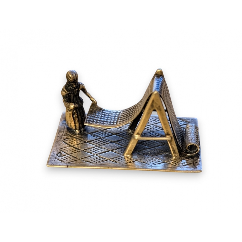 Frappeur de tapis en argent