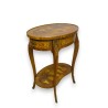 Oval rosewood bedside table at  Moinat SA  - Antiques and home décor