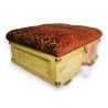 Velvet-upholstered storage pouffe at Moinat SA – Antiques and home décor