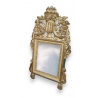 Miroir doré fronton urne de fleurs