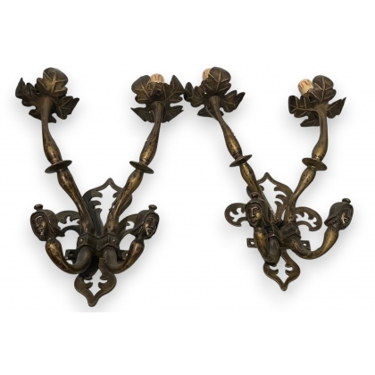 A pair of Renaissance-style bronze wall lights