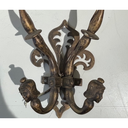 A pair of Renaissance-style bronze wall lights