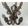 A pair of Renaissance-style bronze wall lights