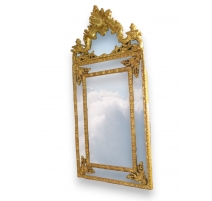 Miroir style Régence en bois doré