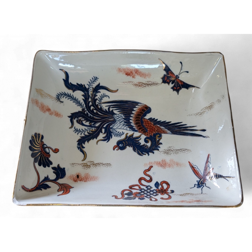 Plat Griphon en faïence de Lunéville