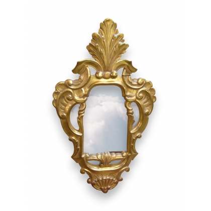  Miroir en bois sculpté et doré sur  Moinat SA  - Antiquités décoration