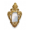 Miroir en bois sculpté et doré