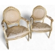 Paire de fauteuils style Louis XVI dorés