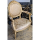 Paire de fauteuils style Louis XVI dorés