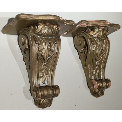 A pair of gilded wooden side tables