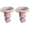 Pair of pink cast-iron urns