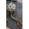 Pair of lanterns with a cast-iron bracket