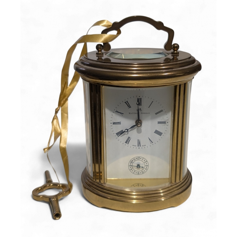 Oval clock by Matthew NORMAN